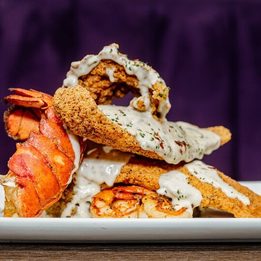 The Boss Seafood Stack at The Greasy Spoon — fried catfish, lobster tail, shrimp